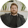 Ricky Schay, bearded, in a black jacket